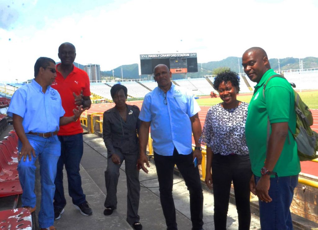 Members of the Trinidad and Tobago Secondary Schools Track and Field Association (TTSSTFA), officials of the NAAA and Ministry of Education on a site visit of the Hasely Crawford Stadium in Mucurapo, yesterday, ahead of the National Secondary Schools Track and Field Championships.  From left:  Arnold Ramlogan (Committee member),  Durly Lucas (NAAA representative), Shelly Slater (Cirriculum Officer, Ministry of Education), Dr Philip Allard (TTSSTFA president), Janelle Edwards (TTSSTFA vice-president/IAAF-Technical Official) and Andy Joseph (TTSSTFA Secretary).