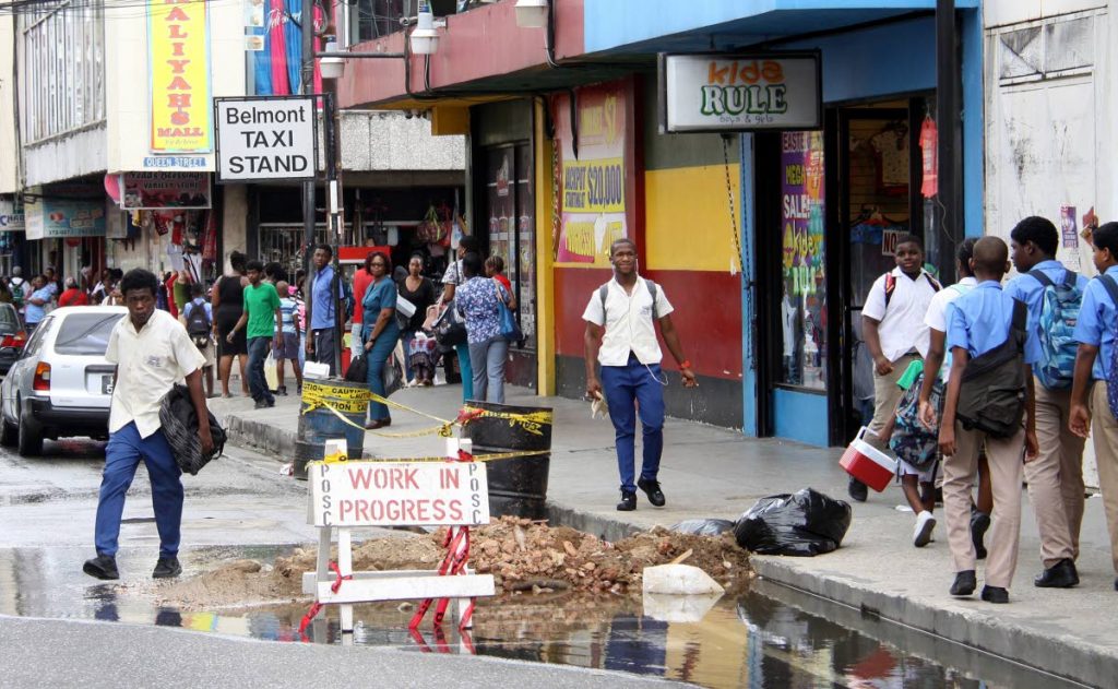Road repairs to be completed on Charlotte Street in Port of Spain. PHOTO BY ANGELO MARCELLE