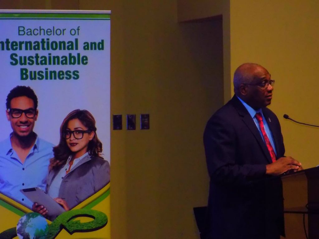 UWI St Augustine Campus Principal Professor Brian Copeland speaks to attendees at the launch of the International and Sustainable Business undegraduate degree programme at the Arthur Lok Jack Global School of Business at Mt Hope this morning.