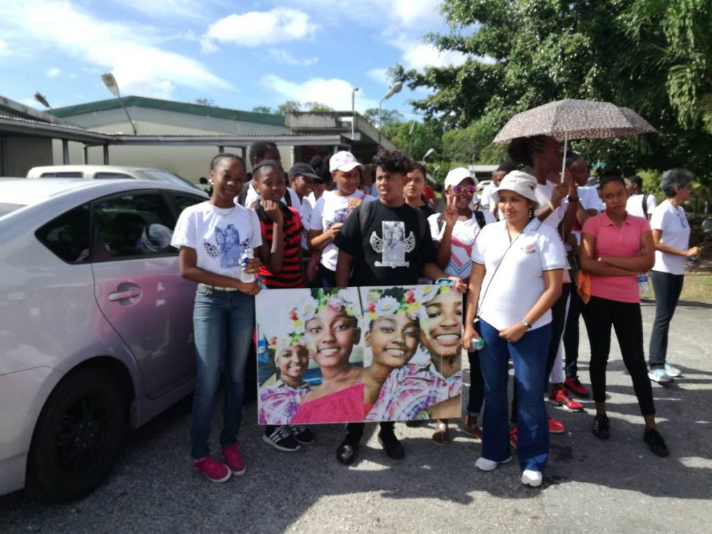 The peace march in Point Fortin yesterday which turned into a memorial for two young girls murdered in La Brea recently.