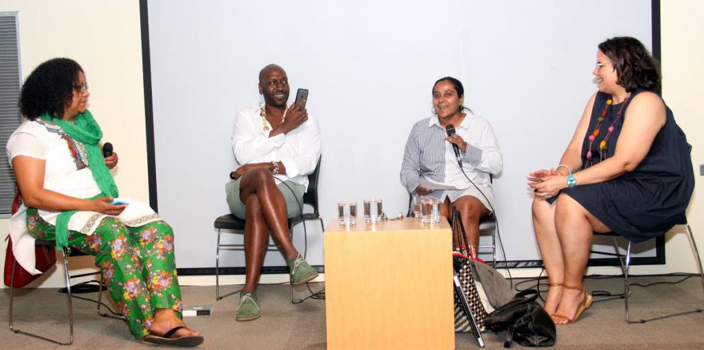 The talk: Writer Lisa Agostini-Allen, poet Kei Miller, writer Anu Lakhan and filmmaker Mariel Browne dicusss the legacy of writer and editor Wayne Brown at the Bocas Lit Fest, National Library, Port of Spain last Friday.