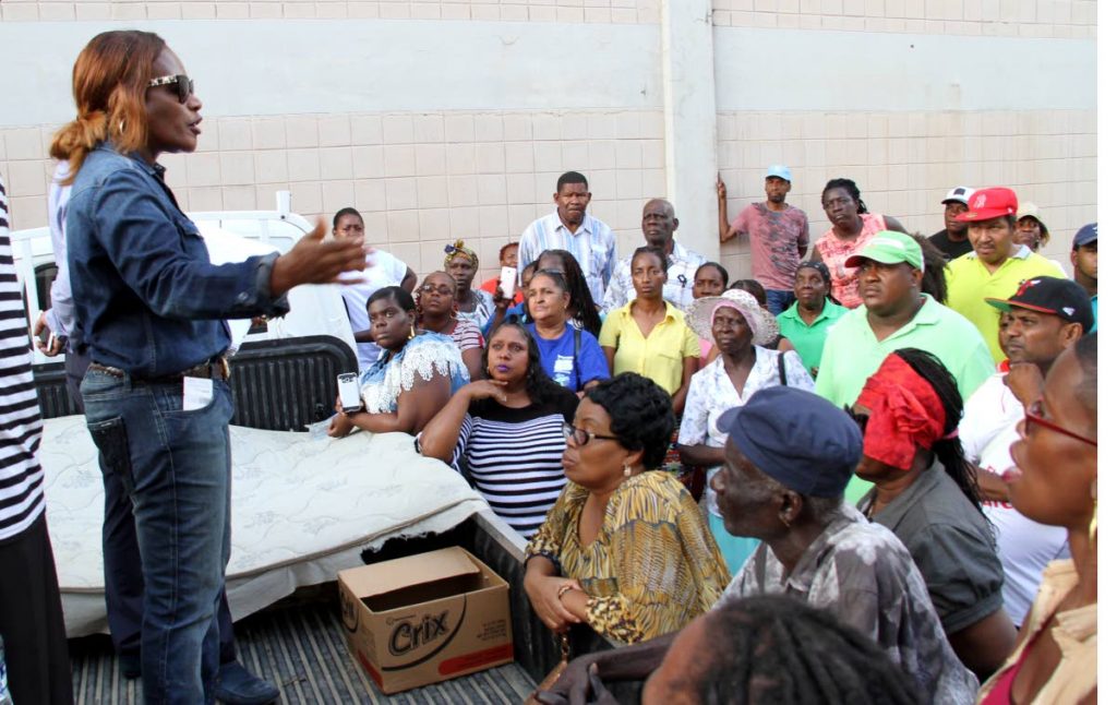 I’LL FIGHT FOR YOU: UNC deputy political leader Jearlean John 
addresses vendors on Charlotte Street in Port of Spain yesterday. PHOTO BY SUREASH CHOLAI