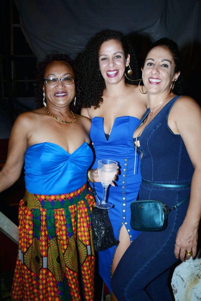 NICE PEOPLE, NICE TIME: These women pose for a photo at the Tobago Jazz Experience on Saturday.