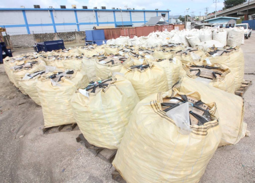 Bags filled with crushed plastic bottles to be repurposed as raw material for the manufacturing industry at the launch of SWMCOL’s plastic bottle treatment facility at the Port of Spain market on January 5. File photo