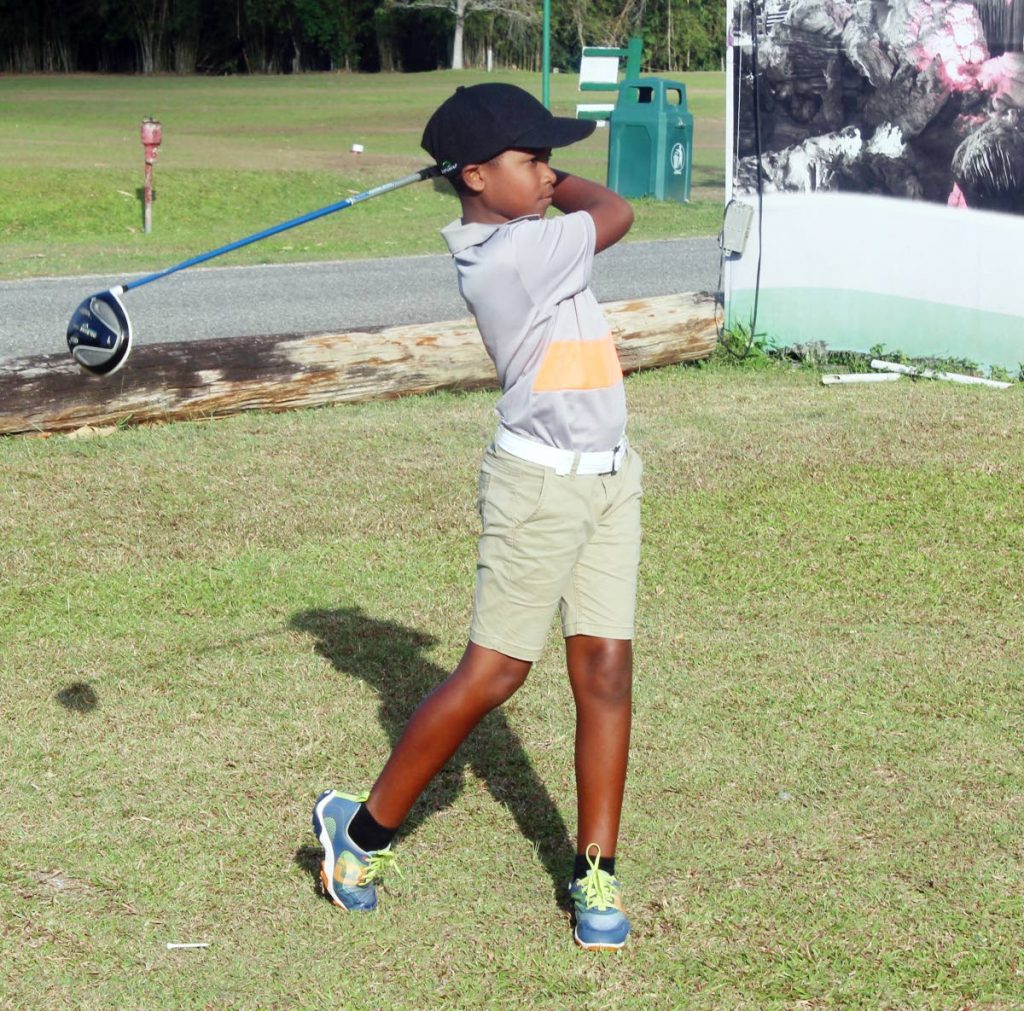 Isaiah Rowley plays a shot at Chaguaramas Golf Course during practice on April 26. PHOTO BY ENRIQUE ASSOON