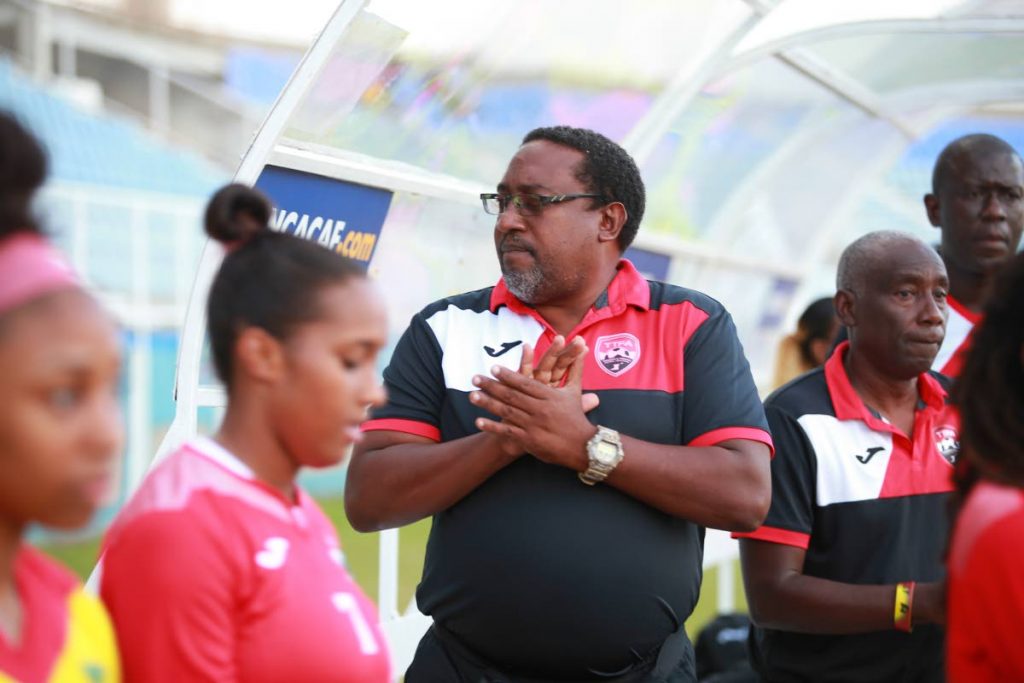 National women’s football coach Jamaal Shabazz, centre, is keen to see this country be the premier force in the Caribbean again.
