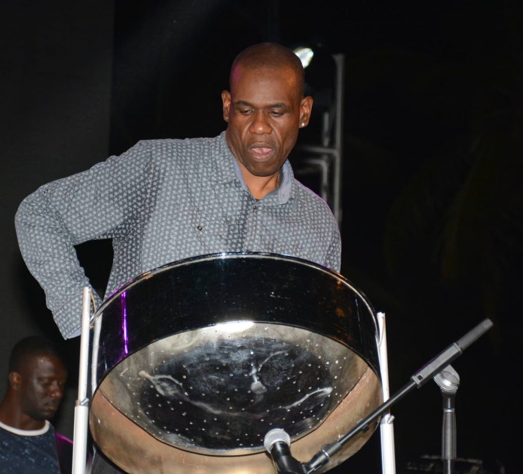 Pannist/arranger Duvone Stewart plays the pan at the International Music Night of the Tobago Jazz experience at the Pigeon Park Heritage Park on Sunday.