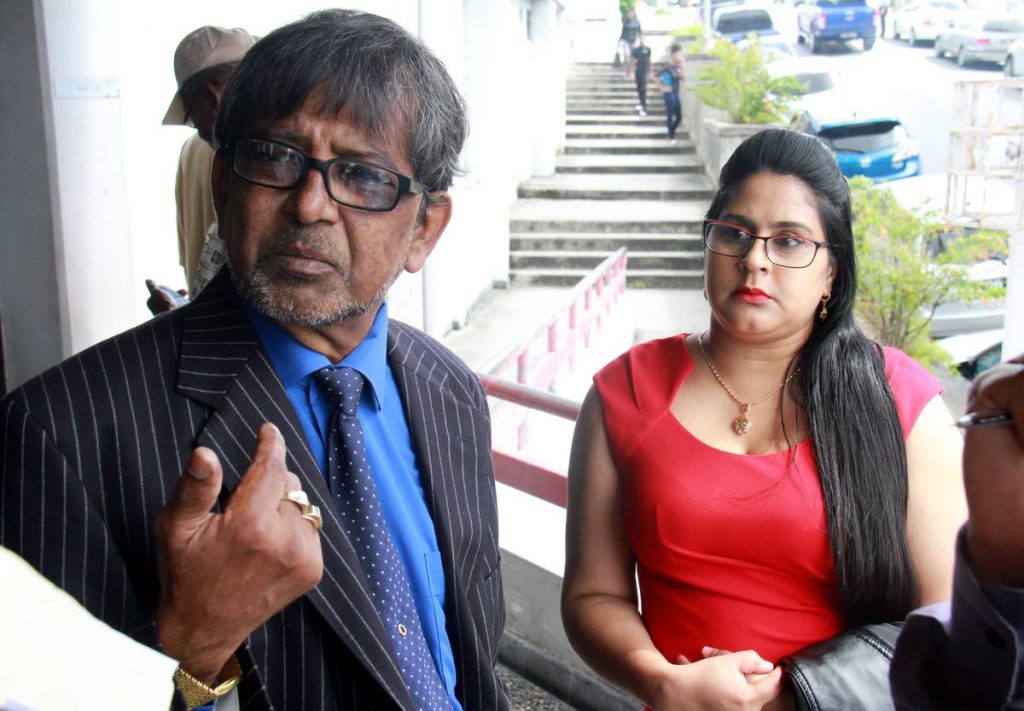 Attorney Odai Ramischand and M.K Wholesalers Ltd director Nadia Khan outside the San Fernando High Court.   PHOTO BY ANIL RAMPERSAD