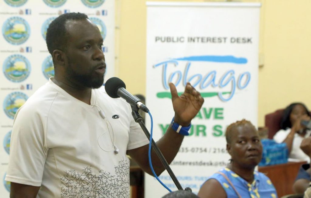 Community member Moses Thomas speaks at a One-on-One community meeting at the Carnbee/Mt Pleasant Community centre on Tuesday night, hosted by the Tobago House of Assembly.