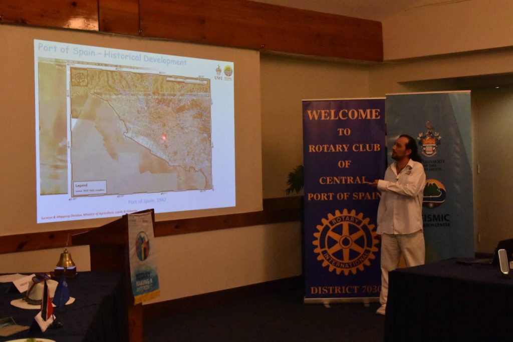 University of the West Indies Seismic Research Centre Engineering Seismologist Ilias Papadopoulos uses a pointer during his presentation yesterday at the Rotary Club of Port of Spain luncheon held at the Normandie Hotel, St Ann’s.