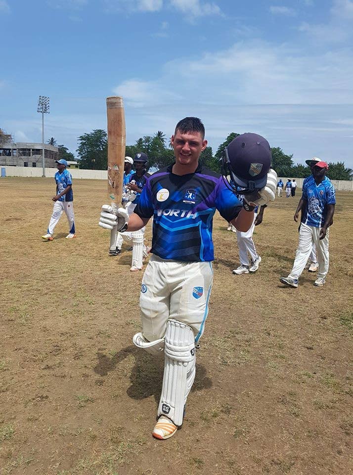 Joshua Da Silva returns to the pavilion after his unbeaten 159 for North Zone against Tobago Zone at the Cyd Gray Ground, Roxborough yesterday.