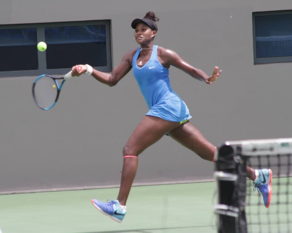 TT’s Yolande Leacock plays a shot against South Africa’s Warona Mdlulwa in the ITF Trinidad Women’s 15000 tournament at the National Racquet Centre, Tacarigua on Wednesday.
