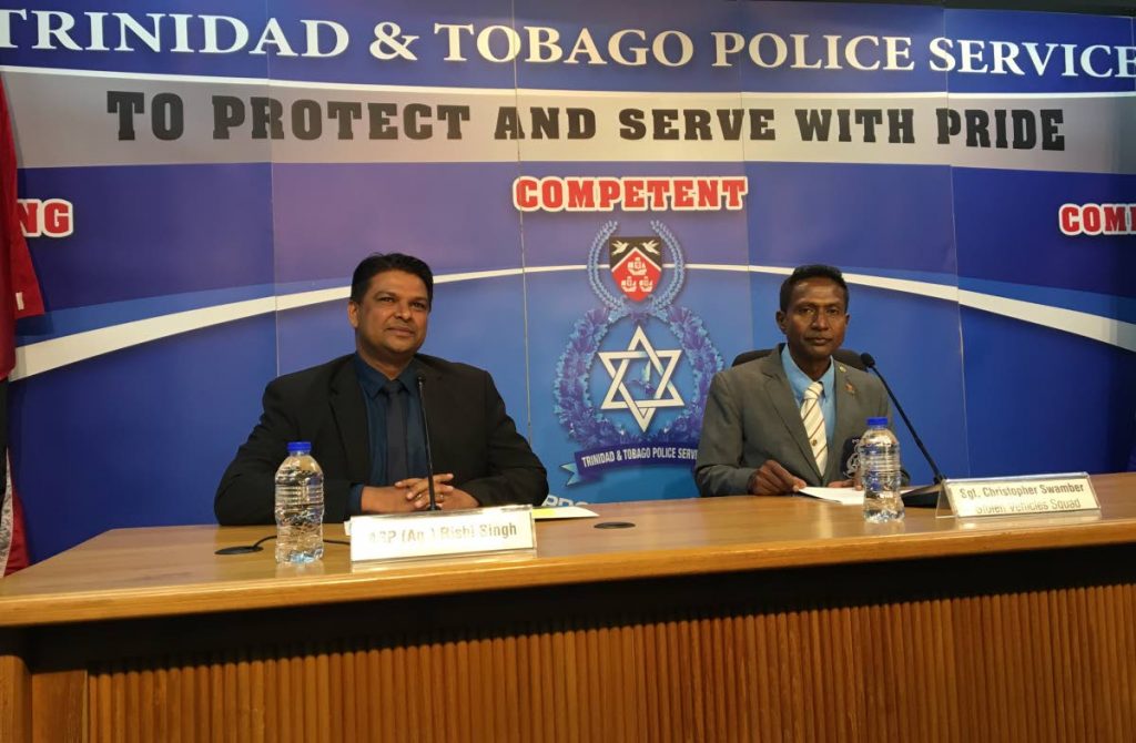 ASP (Ag) Rishi Singh and Sgt Christopher Swamber TTPS