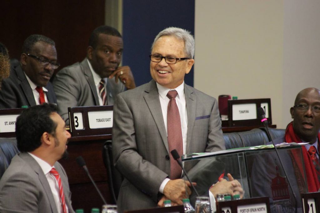 Proud of myself: Finance Minister Colm Imbert makes a confident statement on the economy, as MPs Staurt Young, from left, Edmund Dillon, Lovell Francis and Prime Minister Dr Keith Rowley, right, on the economy during his mid-year review in Parliament last Thursday. PHOTO BY ROGER JACOB