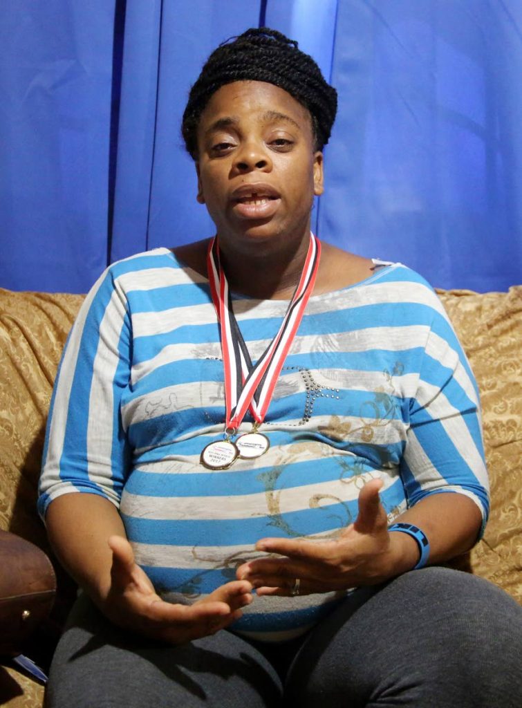 IT’S NOT EASY: Aneiasha Blackburn, mother of Noah Simmons who was shot dead on his 16th birthday last Tuesday, speaks with Newsday at her sister’s home in Bayshore, Marabella yesterday.