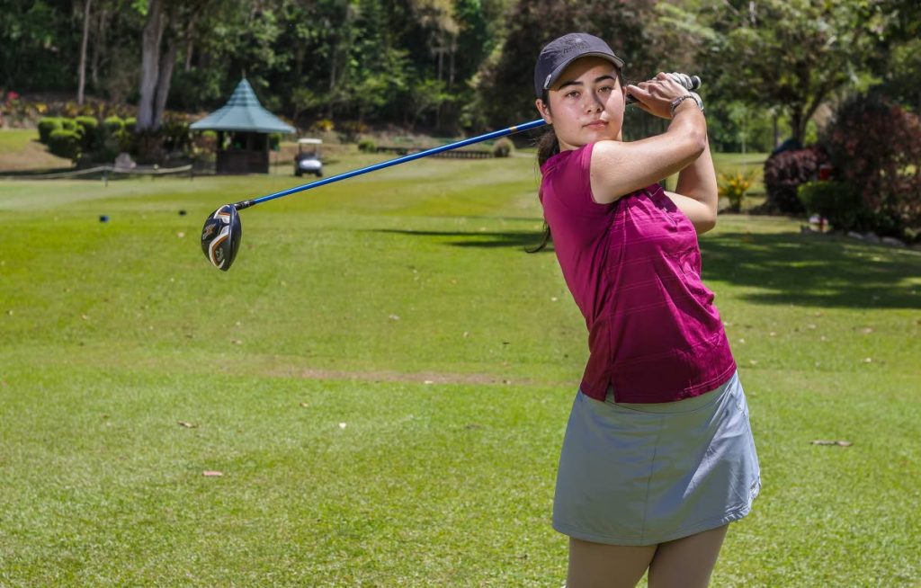 Serena Mackenzie takes a swing at St Andrew’s Golf Course.