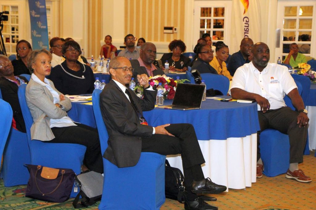 Health Secretary Dr Agatha Carrington, second from left, sit with   presenters at the opening of the 4th Annual Family Medicine Conference held over the weekend at the Magdalena Grand Beach and Golf Resort in Lowlands.