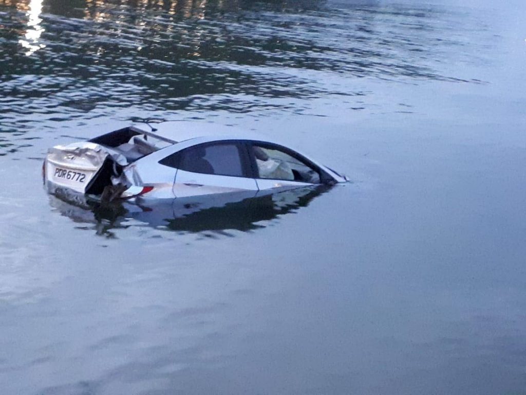 Car crashes into boardwalk - Trinidad and Tobago Newsday