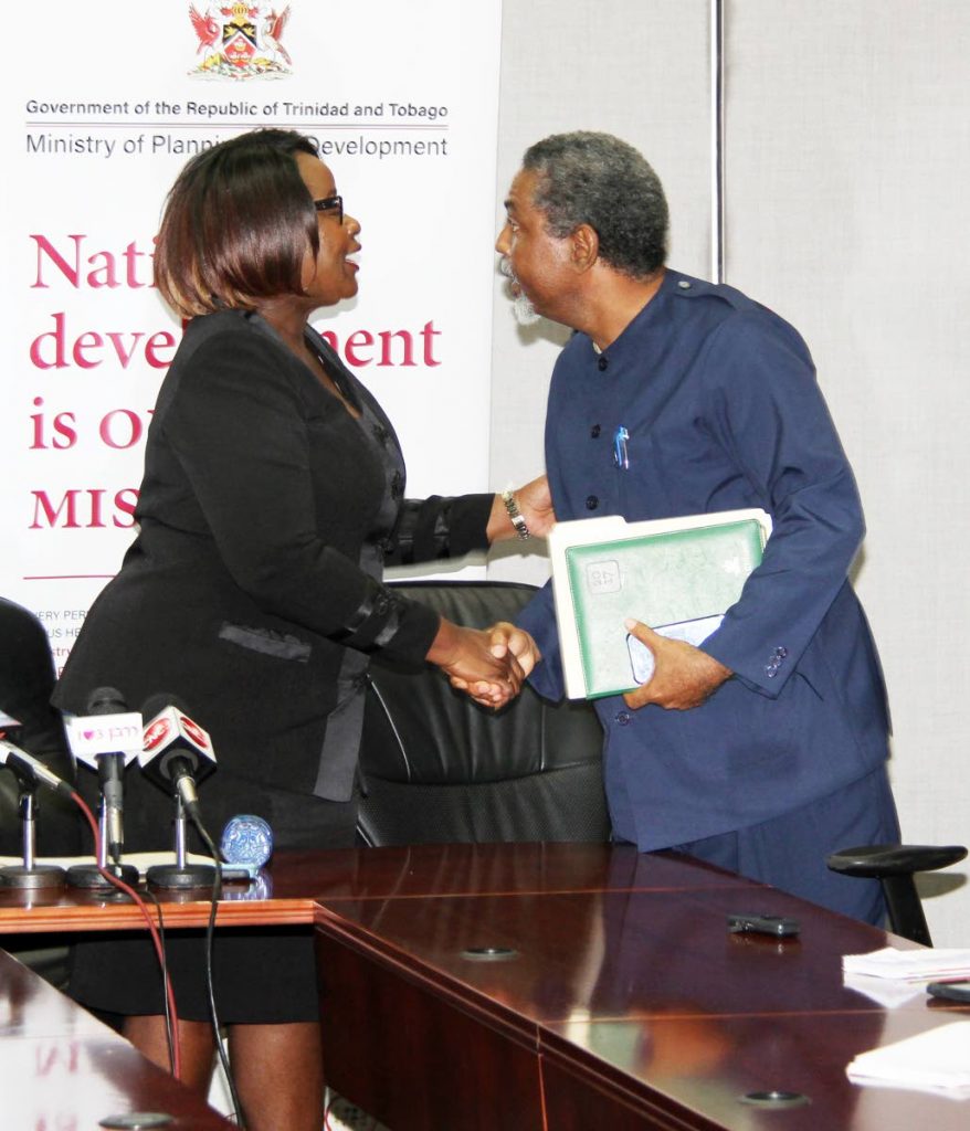 Welcome back: National Tripartite Advisory Council chairman Camille Robinson-Regis greets Vincent Cabrera, president of the Banking, Insurance and General Workers Union (BIGWU), as members of the labour movement return to the council at Eric Williams Financial Complex, Port of Spain on September 20, 2017. PHOTO BY SUREASH CHOLAI. 