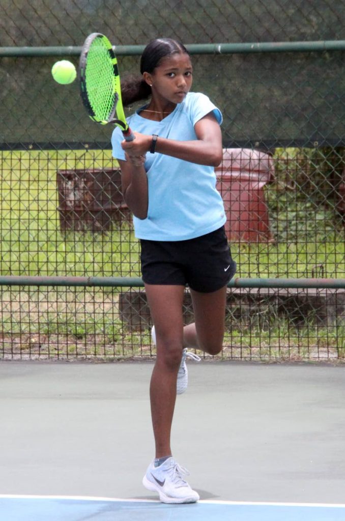 CHAMP: Cameron Wong won the U-14 singles title yesterday at the Lease Operators Junior Tennis held at Trinidad Country Club, Maraval.