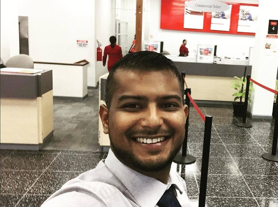 SHOT AND WOUNDED: Scotiabank teller Rostan Mahabir who was shot by a bandit who later stole his laptop. 