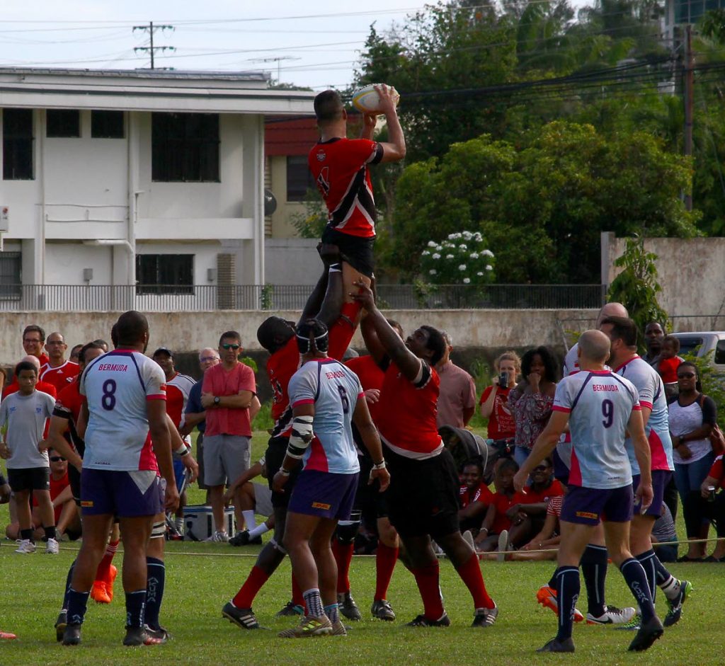 TT’s Kirby Hosang is lifted in a line out during play between Bermuda, at the St Anthony’s College Grounds, Westmoorings, last month. TT face off against USA South today at the St Mary’s College grounds.
