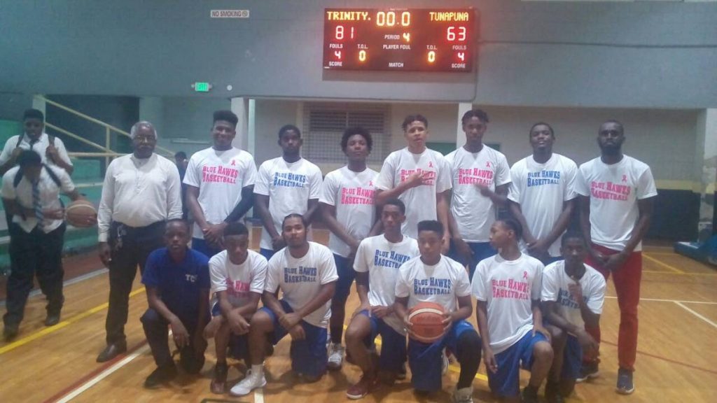 Newly-crowned Under-17 division winners in the TT East Zone Secondary Schools Basketball League, Trinity College East pose for a team photo after beating Tunapuna Secondary 81-63 yesterday, at the Maloney Indoor Sporting Complex.