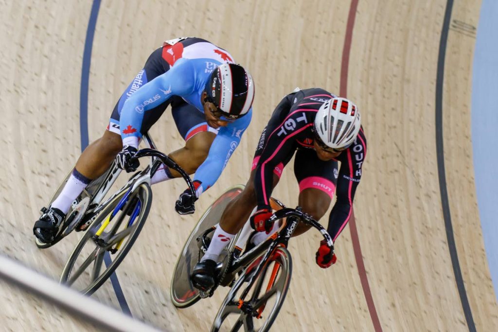 Nicholas Paul of Breakaway, right, defeats Canada’s Je’Land Sydney in the Sprint quarter-final at the PSL 
Fire on Wheels held on the weekend at the National Cycling Centre, Balmain, Couva.