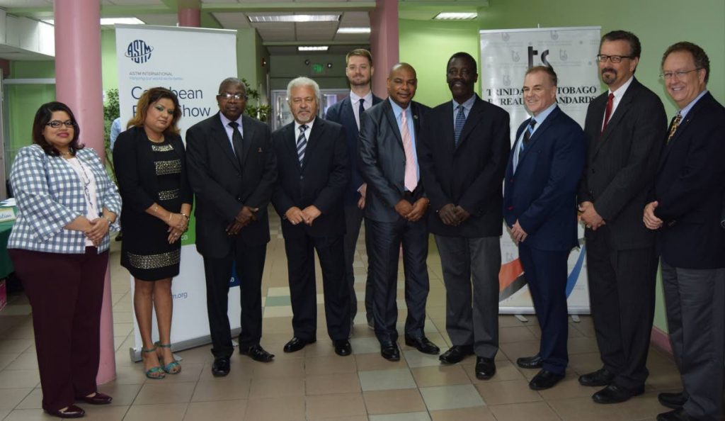 ASTM International Roadshow on Sustainable Construction: (Fourth from right) Norris Herbert, Permanent Secretary in the Ministry of Trade and Industry, poses for photos with fellow attendees of the Trinidad edition of the 2018 ASTM International Roadshow on Sustainable Construction, held at TT Bureau of Standards, Trincity Industrial Estate, Macoya on June 6, 2018. PHOTO COURTESY THE MINISTRY OF TRADE AND INDUSTRY.