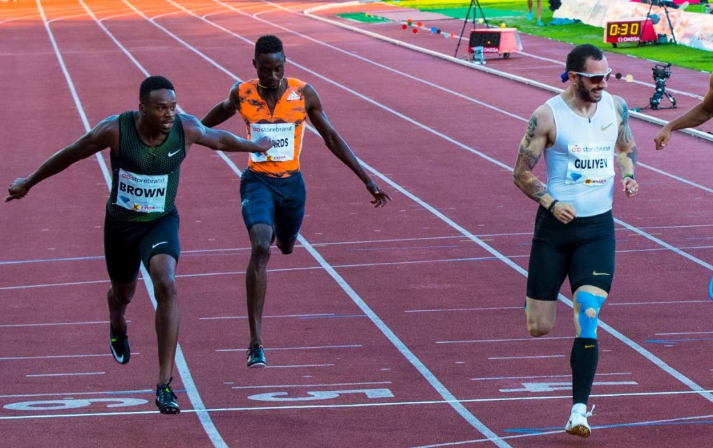 Turkey’s Ramil Guliyev, right, takes gold in the Men’s 200m, ahead of runner-up Aaron Brown of Canada, left, and third-placed Jereem Richards of TT, centre, in the IAAF Diamond League 2018 Bislett Games in Oslo, Norway, yesterday.