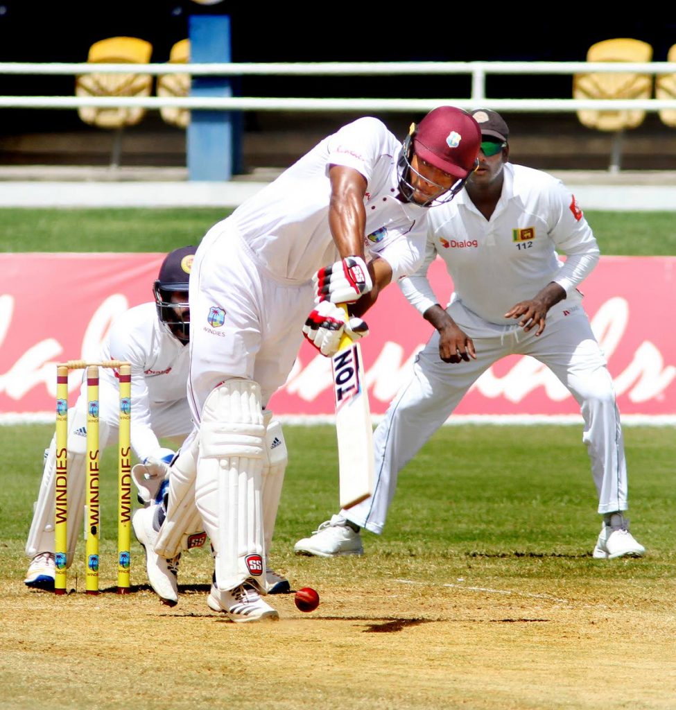 Kieran Powell plays a shot, yesterday,on Day 4 of the first Test against Sri Lanka, at the Queen’s Park Oval, Port of Spain. Powell resumed the day’s play on 64 and added a further 24 runs to the score, before miscuing a Dilruwan Perera ball to midwicket. Photo by  SUREASH CHOLAI
