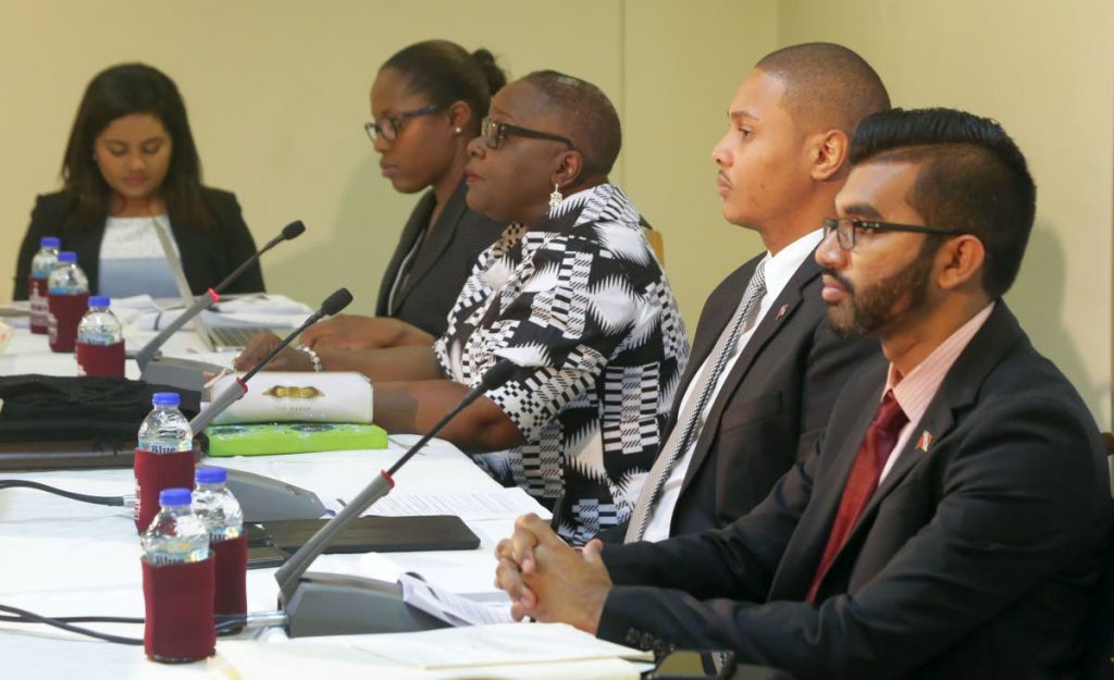 Camille Robinson-Regis, third from left, Chairman of the Joint Select Committee on the Constitution (Amendment) (Tobago Self-Government) Bill, 2018, along with Deputy Chairman, Senator Nigel de Freitas, second from right, and Independent Senator, Saddam Hosein, appear at the public consultation on the bill in Sunday at the Victor E Bruce Financial Complex in Scarborough. Others in photo are, from left, graduate research assistant Melanie Chin and assistant secretary Keiba Jacob. (THA Photo)