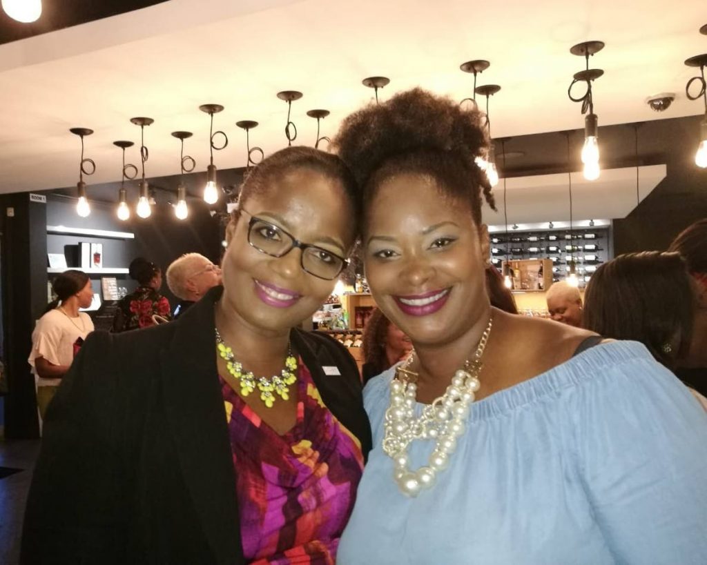 President of the Association of Female Executives of TT (AFETT) president (left) Yolande Agard-Simmons with AFETT's director of programmes Sherleen Young Griffith at AFETT's Social at Uncorked, Port of Spain in August 2017. PHOTO COURTESY AFETT.