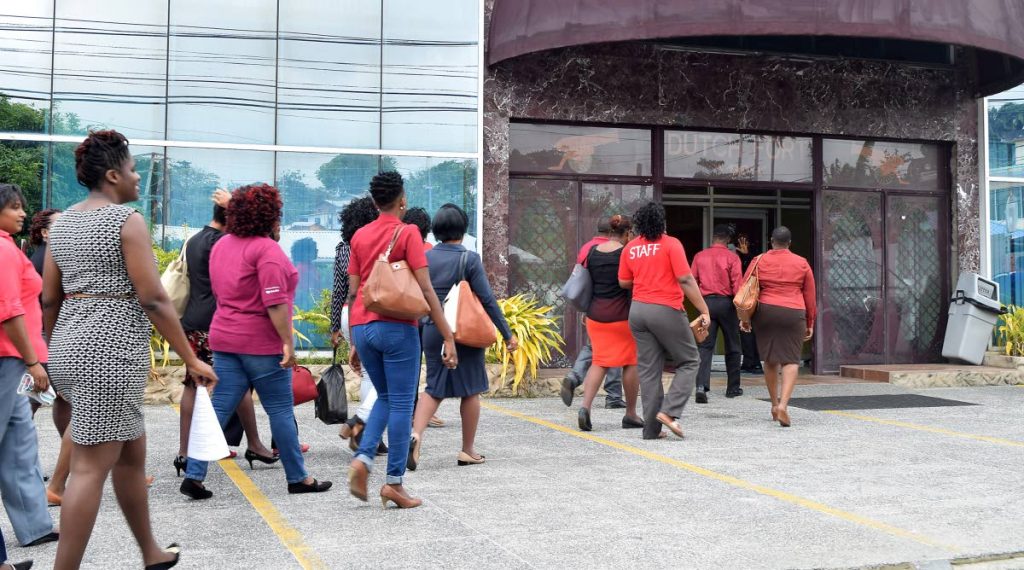 Teachers protesting a lack of action on appointments, file into the Division of Education’s head office at Dutch Fort Street, Scarborough on Tuesday, hoping for a meeting with 
Administrator Jacqueline Job.
