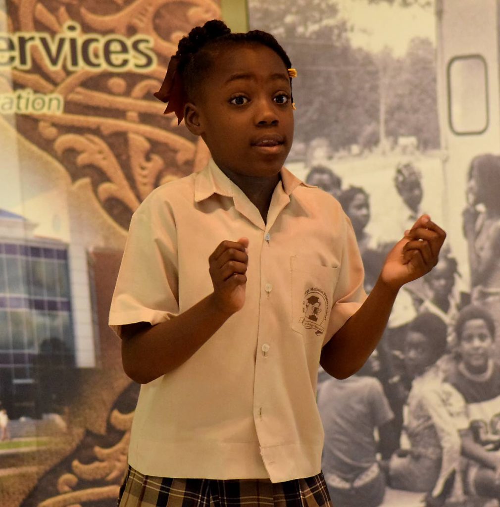 Kwanice Mc Clean, of Mt St George Methodist Primary School, tells the story of Monkey and Alligator at the finals of the Tobago Library Services/ Republic Bank Ltd’s 3rd Annual Storytelling Competition at the Anne Mitchell-Gift Auditorium, Scarborough Library last Thursday.