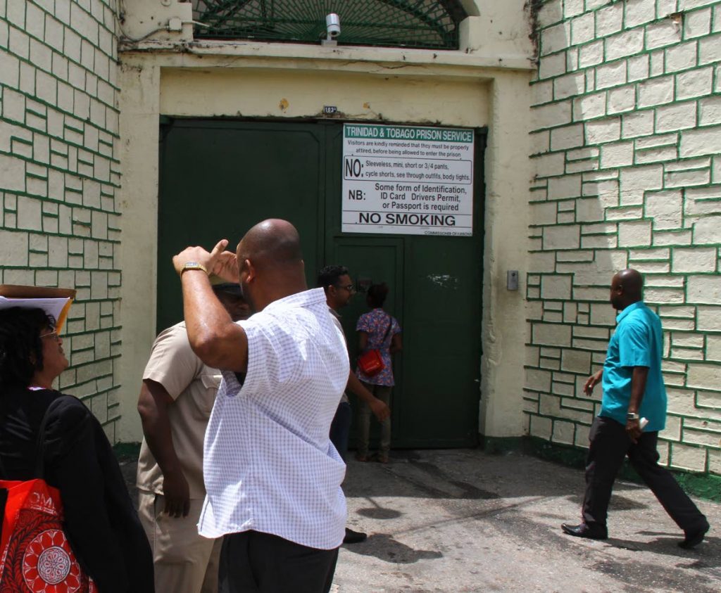 Members of the public wait to visit prisoners at the Port of Spain Prison, Frederick Street, Port of Spain. FILE PHOTO