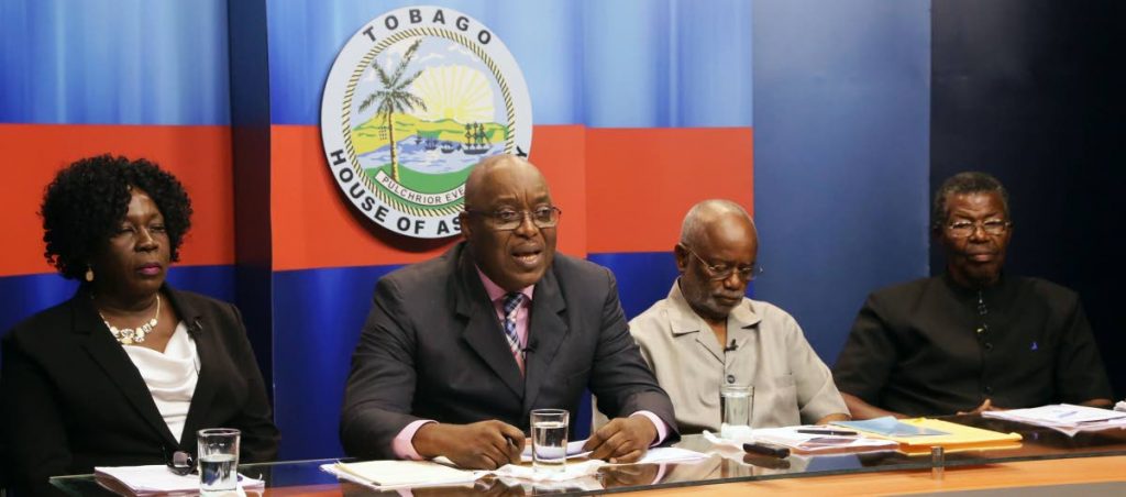 Chief Secretary Kelvin Charles, second from left, speaks at a press conference last Thursday on the Tobago autonony bill at the Administrative Complex.  Others in photo are Ingrid Melville, legal advisor to the Forum, Stanford Callender, chairman  of the Tobago Council of the PNM, second from right, and Hochoy  Charles, political leader of the The Platform of Truth (TPT), and a former THA chief secretary.