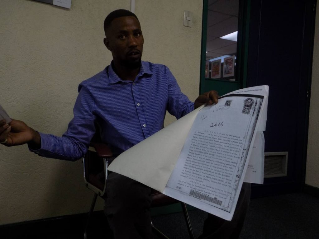 34-year-old Marvin Ganteaume holds a copy of what he says is a deed dating back to the early 20th century, granting his ancestor the right to property in St Joseph. 
Ganteaume claims he is the descendent of the Gantreaume family, French plantation owners who settled in Mayaro during the 18th century.