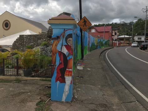 Students from ten secondary schools put their talents together to complete this 160-ft mural at the St Francis RC Church, Belmont.