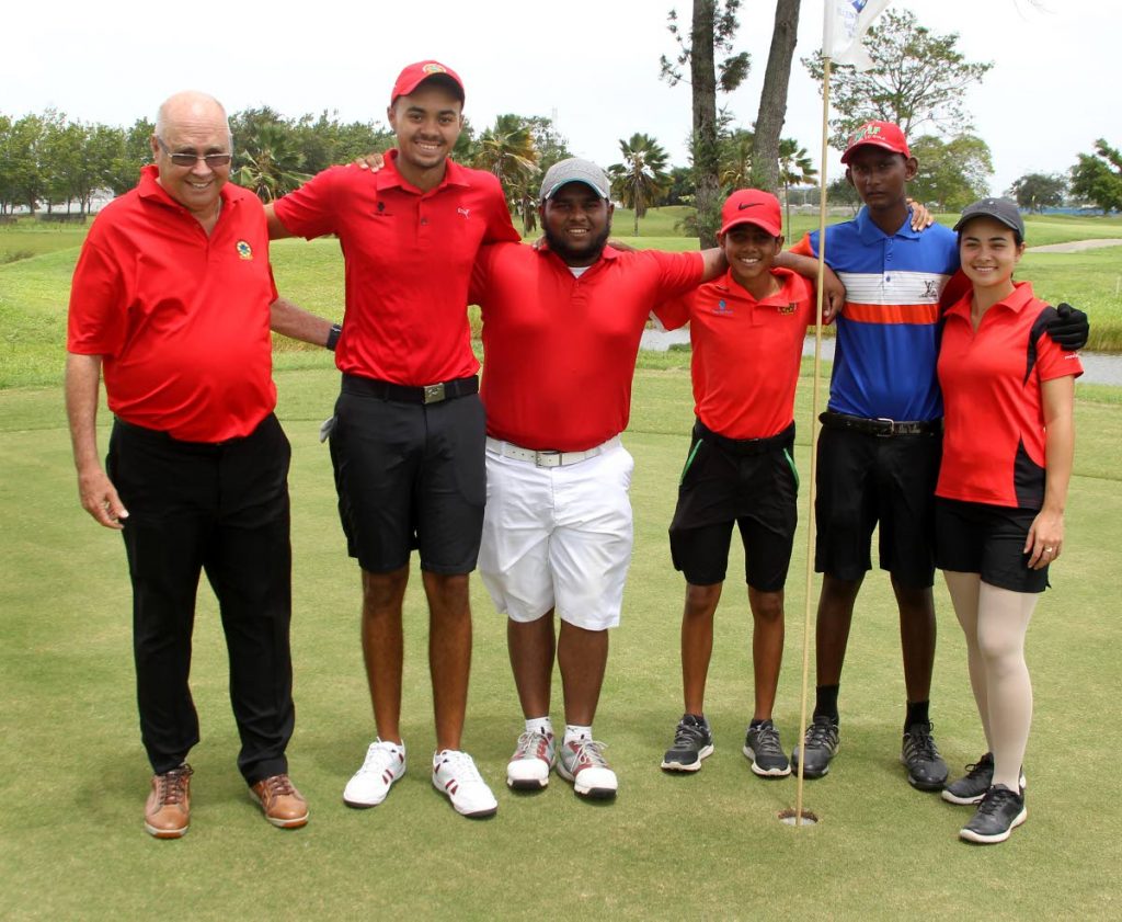 (From left) Director of TT Golf Association and national junior coach Chris Harries poses with junior golfers Ryan Peters, Reyaz Ranadan, Justin Kublalsingh, Dravid Bhim and Serena McKenzie at Millennium Lakes Golf and Country Club, Trincity.