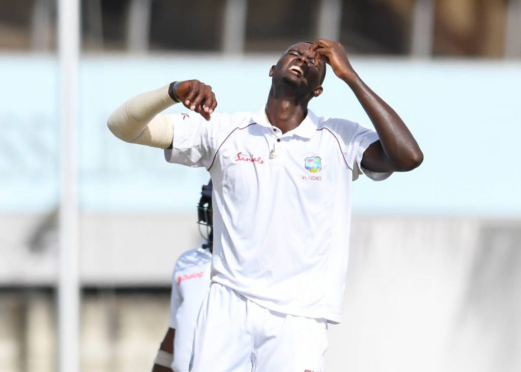 West Indies captain Jason Holder reacts after bowling a ball against Sri Lanka on day four of the 3rd Test yesterday at Kensington Oval, Barbados.