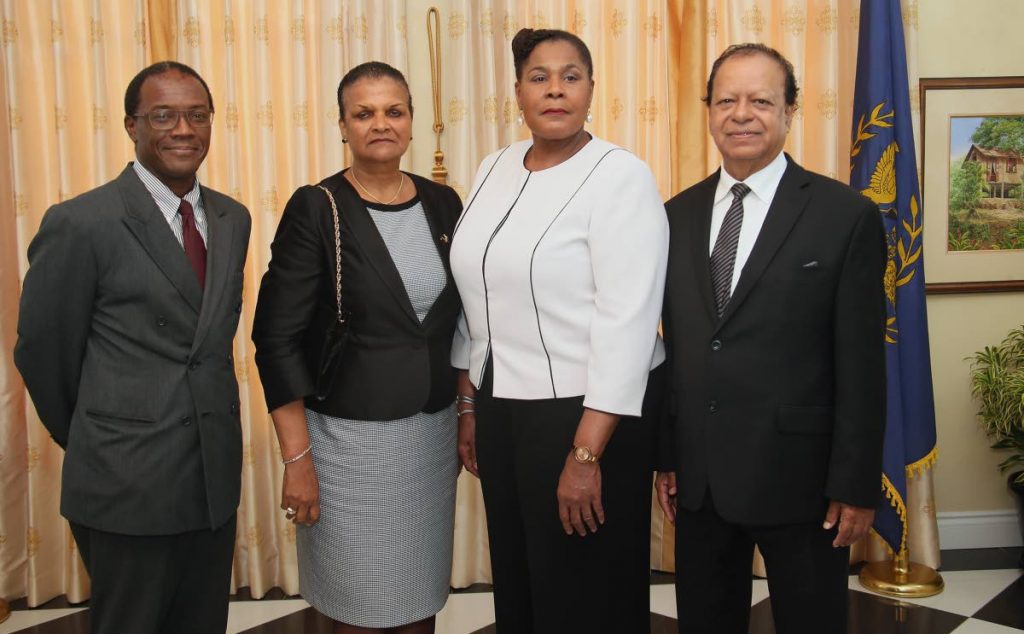 NEW SILK: President Paula Mae Weeks (second from right) with newly sworn in Senior Counsels (from left) Ian Benjamin, Ruth Van Lare and Kemrajh Harrikissoon at the President's Cottage, Port of Spain. 