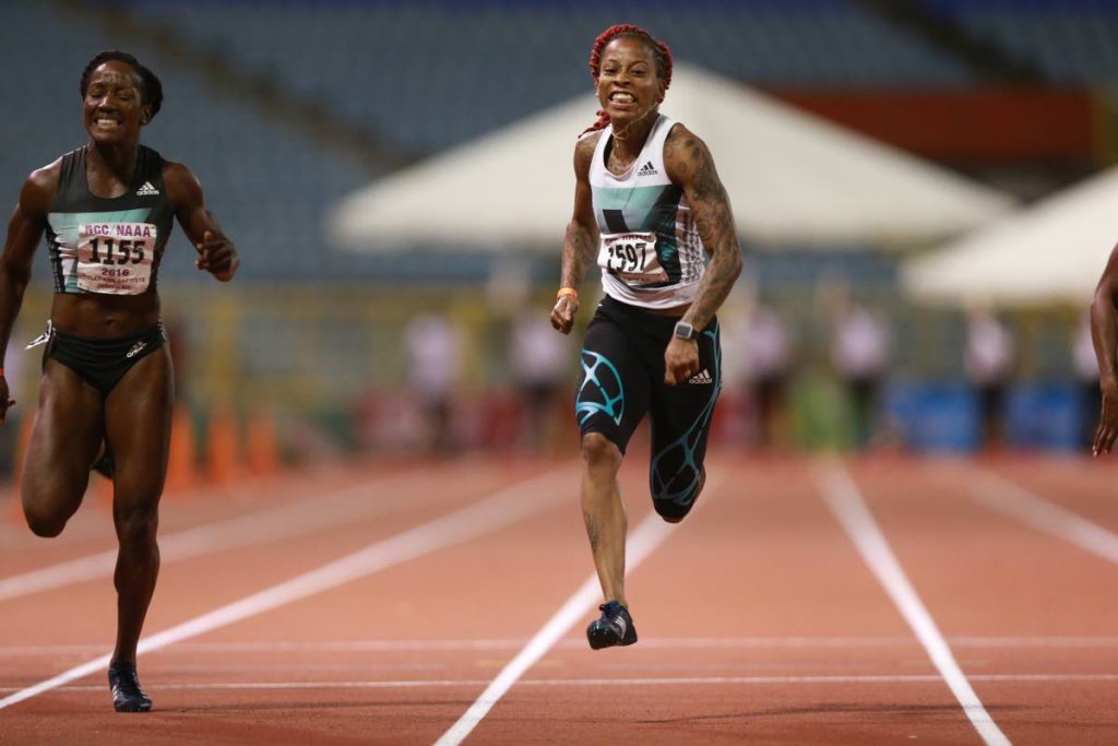 FLASHBACK: Michelle-Lee Ahye (right) sprints to the finish line to capture the women’s 100 metres title at the NGC/Sagicor NAAA National Track and Field Championships last evening at the Hasely Crawford Stadium, Mucurapo, on June 25,2016.  PHOTO BY ALLAN CRANE/CA-IMAGES.