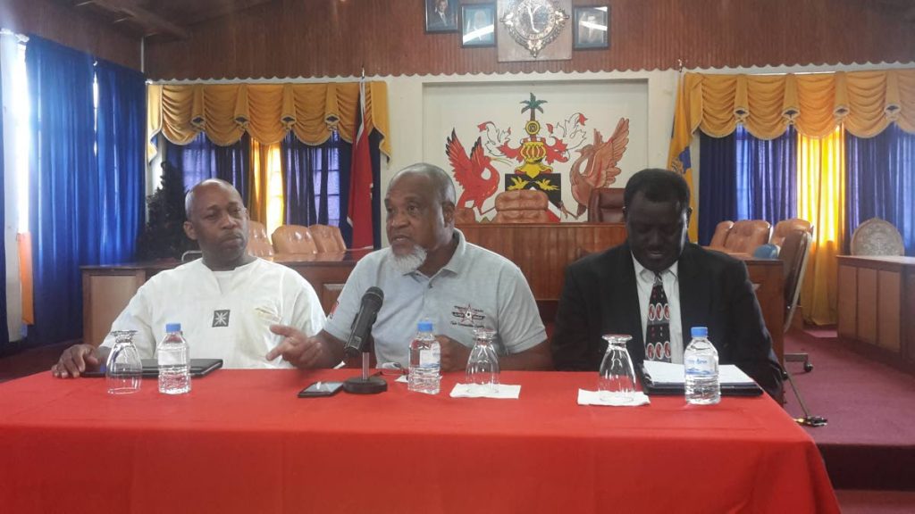 Keith Look Loy, centre, president of the TT Super League, at a press conference , makes a point at a press conference last year alongside Clynt Taylor, left, general secretary of the Central Football Association, and Selby Browne, president of the Veteran Footballers Federation of Trinidad and Tobago. 