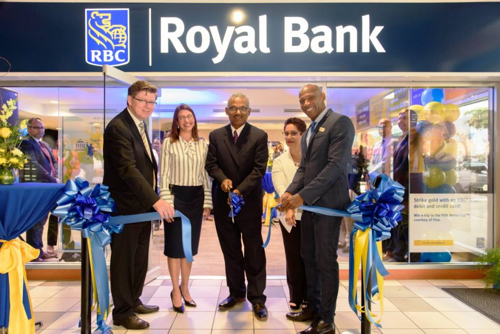 File photo: 
(From left) In this February 27 file photo, RBC head of Caribbean Banking RBC Rob Johnston, regional operating officer Gretchen Camacho-Mohammed, Couva South MP Rudranath Indarsingh, store manager Joanne Forde and RBC Royal Bank TT MD Darryl White cut the ribbon to launch RBC’s Point Lisas Financial Solutions Centre, Atlantic Plaza, Point Lisas. RBC on July 3 announced White is now RBC Financial (Caribbean) Ltd CEO and Camacho-Mohammed is RBC Royal Bank TT MD.