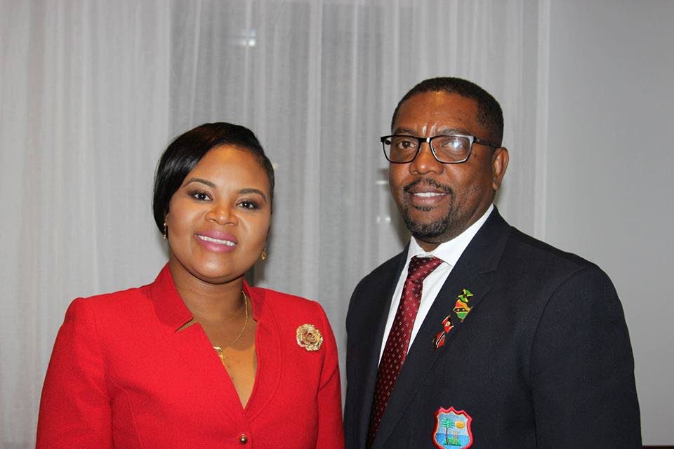 COURTESY CALL: Cricket West Indies president Whycliffe “Dave” Cameron, right, poses with Minister of Sport Shamfa Cudjoe, at the ministry in St Clair, earlier this year. 