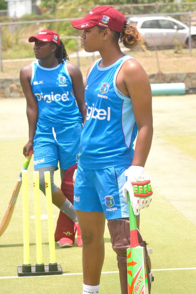 West Indies cricketers Stafanie Taylor, back, and Hayley Matthews take part in a recent training camp at the Coolidge Cricket Ground in Antigua.