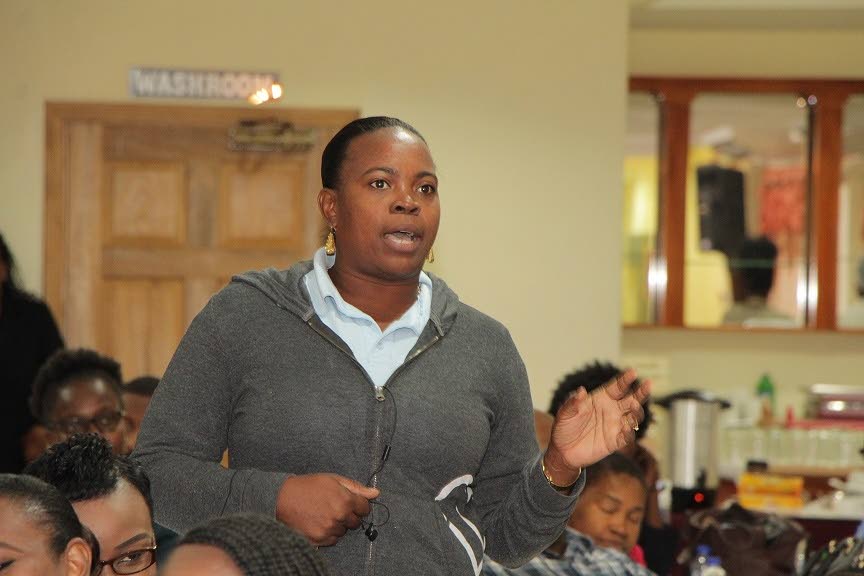 A participant makes a contribution to the discussion at the Substance Abuse Symposium on June 26 hosted by the Alcohol and Drug Abuse Prevention Programme (ADAPP)/ Division of Health.