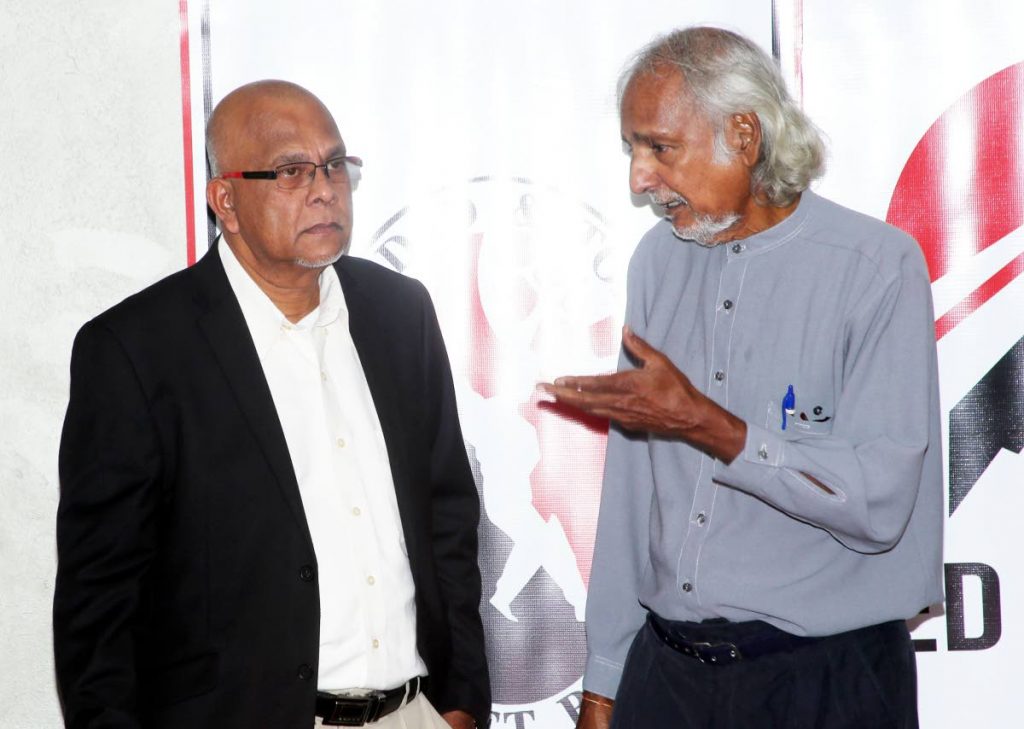 Dr. Allen Sammy right gestures as he is seen speaking to TTCB president Azim Bassarath, left, chats with vice president Dr Allen Sammy at a press conference on Wednesday at the Alloy Lequay Administrative Centre, Balmain, Couva.