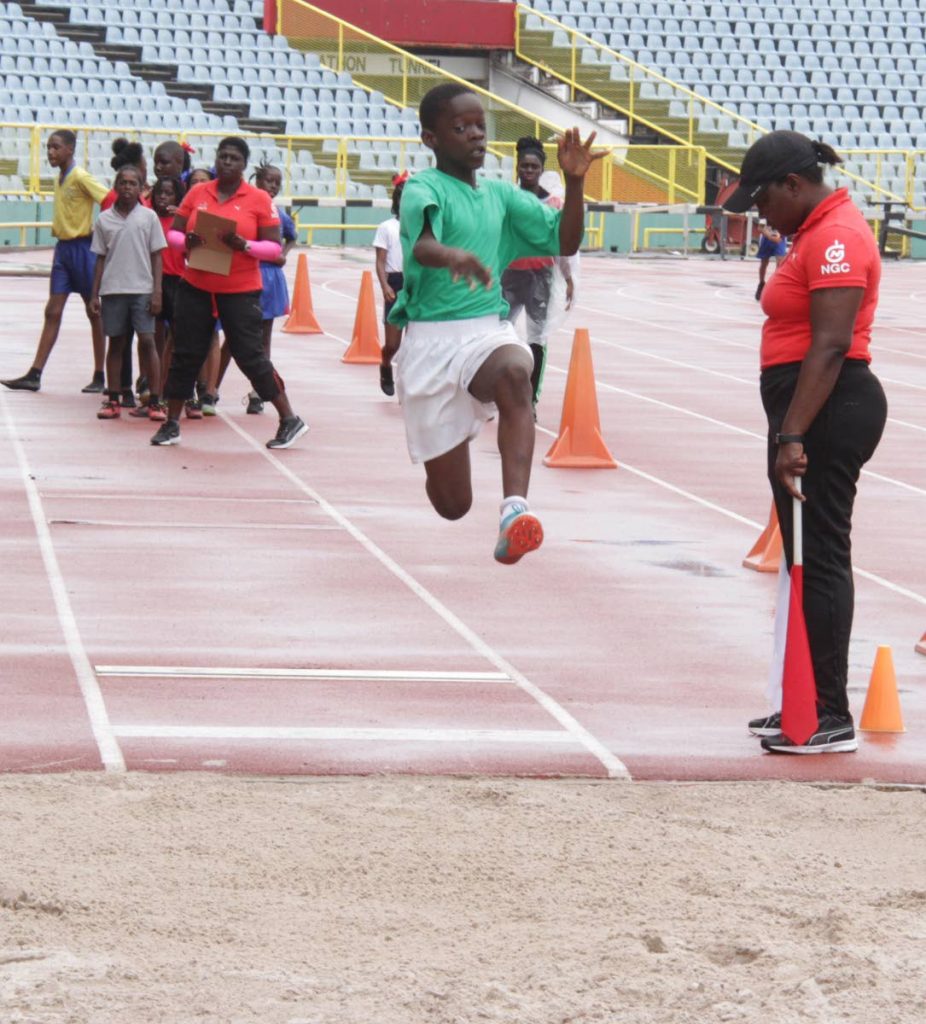 Kelvin Cudjoe competes in the under 13 long jump at the inaugural Laventille Morvant Track & Field Games held at the Hasely Crawford Stadium, Mucurapo, yesterday.